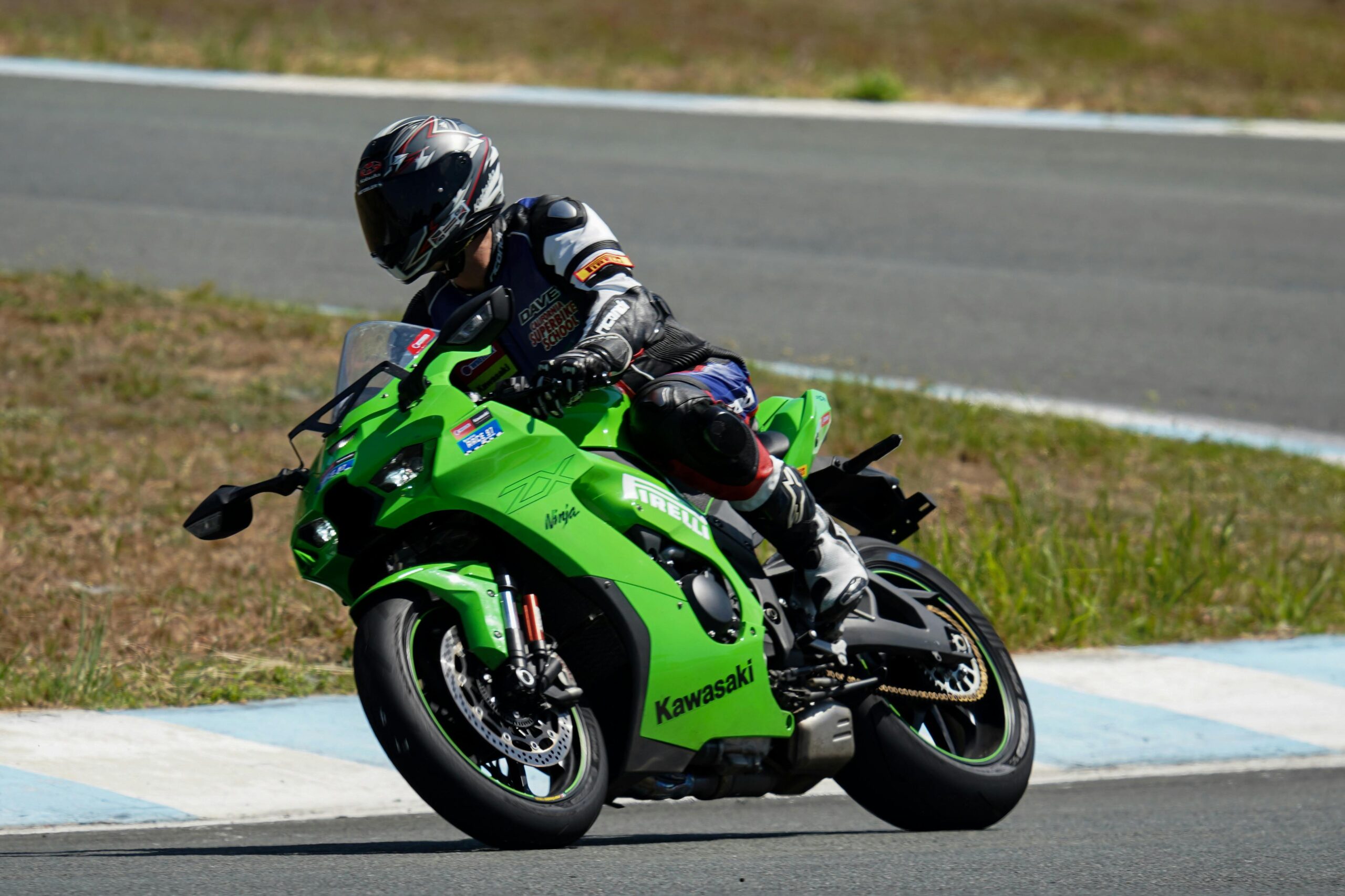 A thrilling motorcycle race on a circuit in Central Luzon, Philippines showcasing high-speed action.